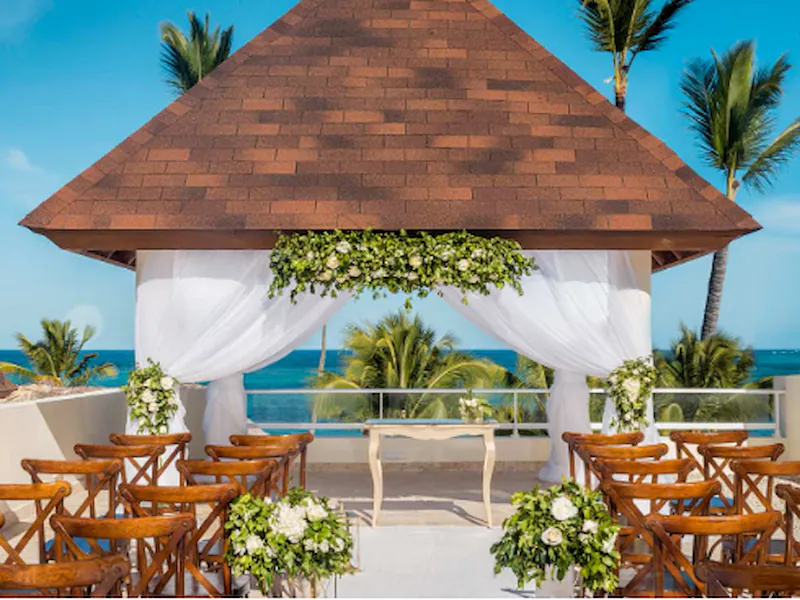 A royal beachfront gazebo wedding venue at Dreams Royal Beach Punta Cana, framing the ocean between white columns