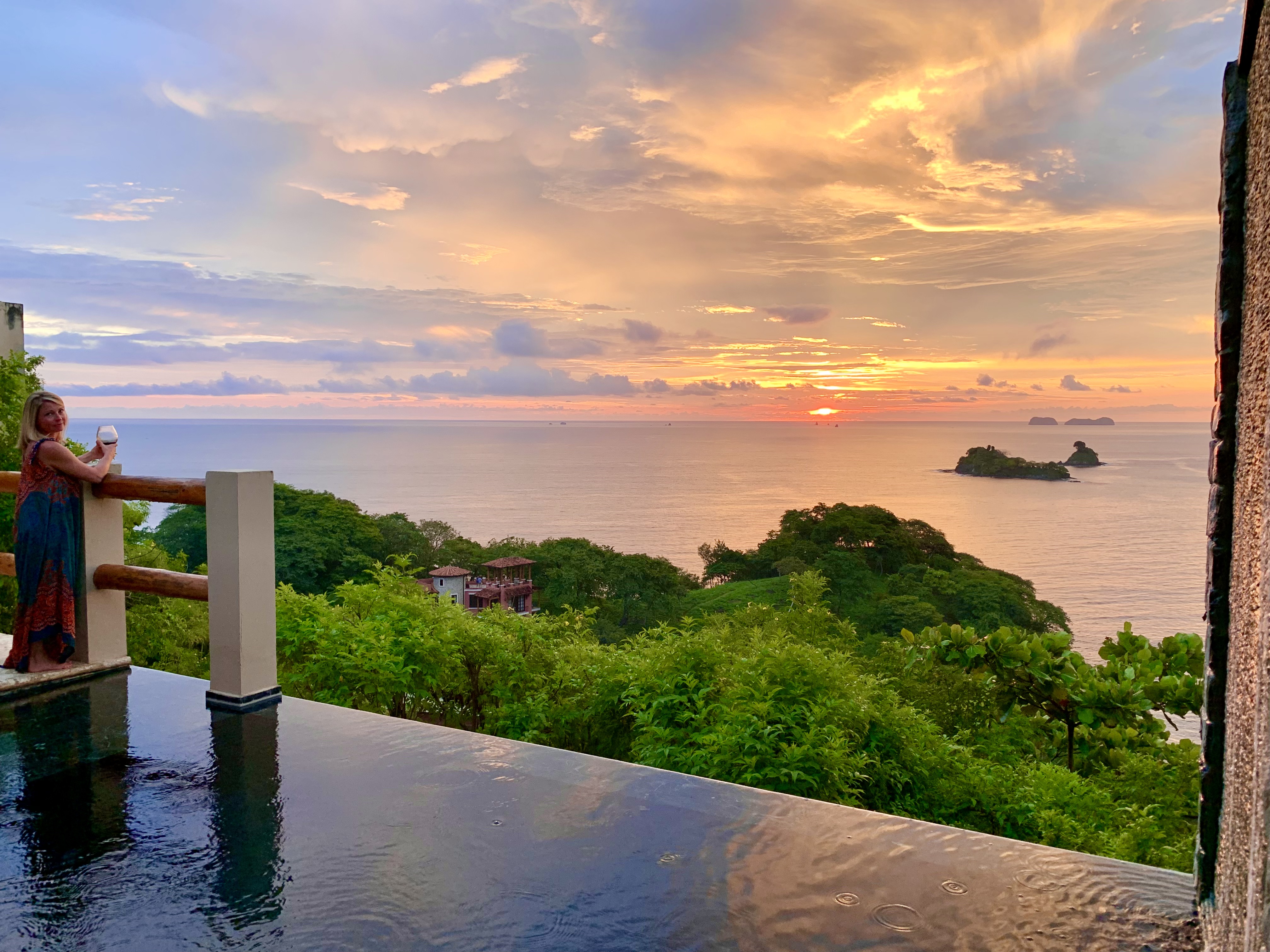 Sunset view over the Pacific Ocean from an infinity pool in Costa Rica