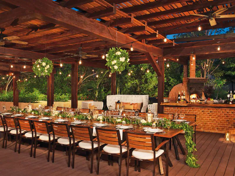 A chef's garden wedding venue at Dreams Riviera Cancun set for an intimate reception, one of the types of options to compare side by side
