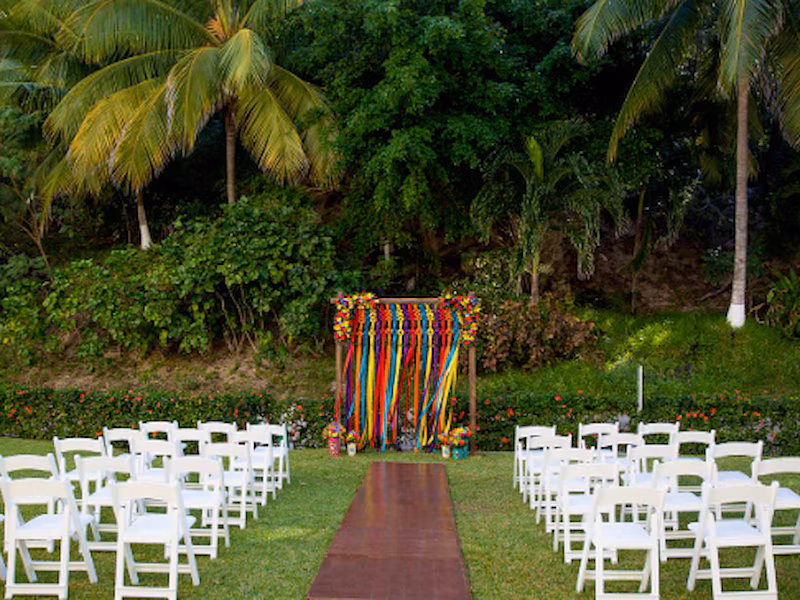 A garden gazebo wedding venue at Dreams Huatulco, one of the settings an independent planner can book and coordinate outside the resort's default package