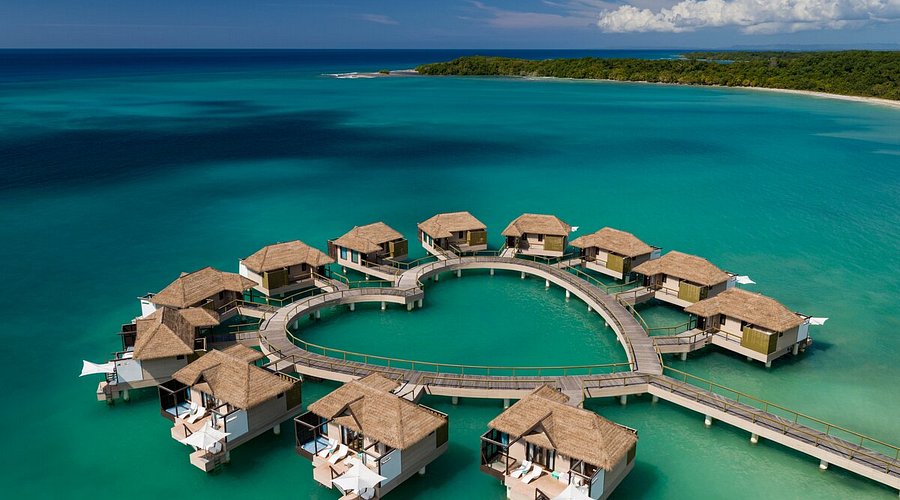 Aerial view of Sandals South Coast along Jamaica's quieter South Coast shoreline with turquoise water and lush greenery