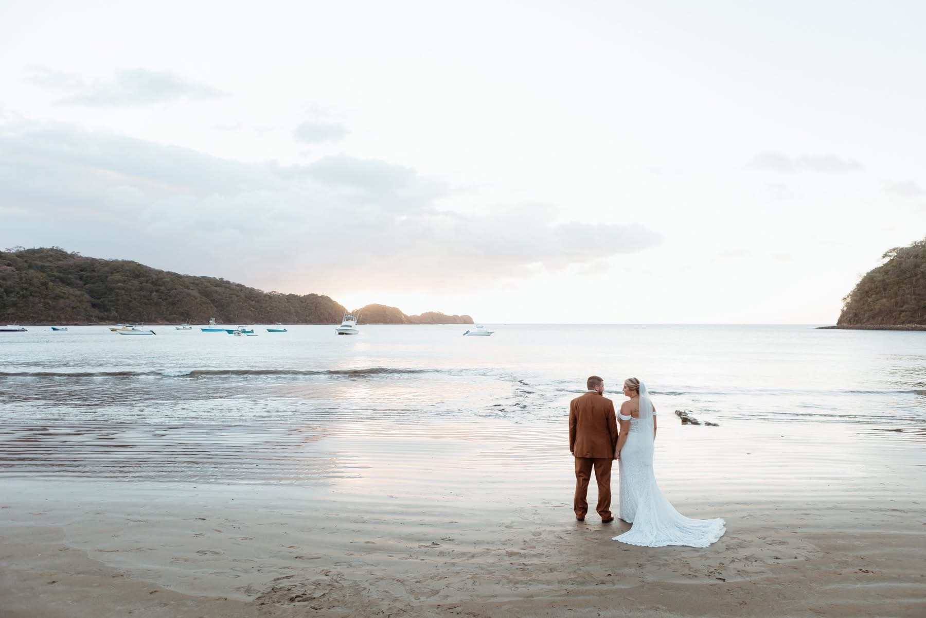 Bride and groom sharing a quiet, romantic moment together at dusk — the kind of private, unhurried scene a pre-ceremony first look is designed to create