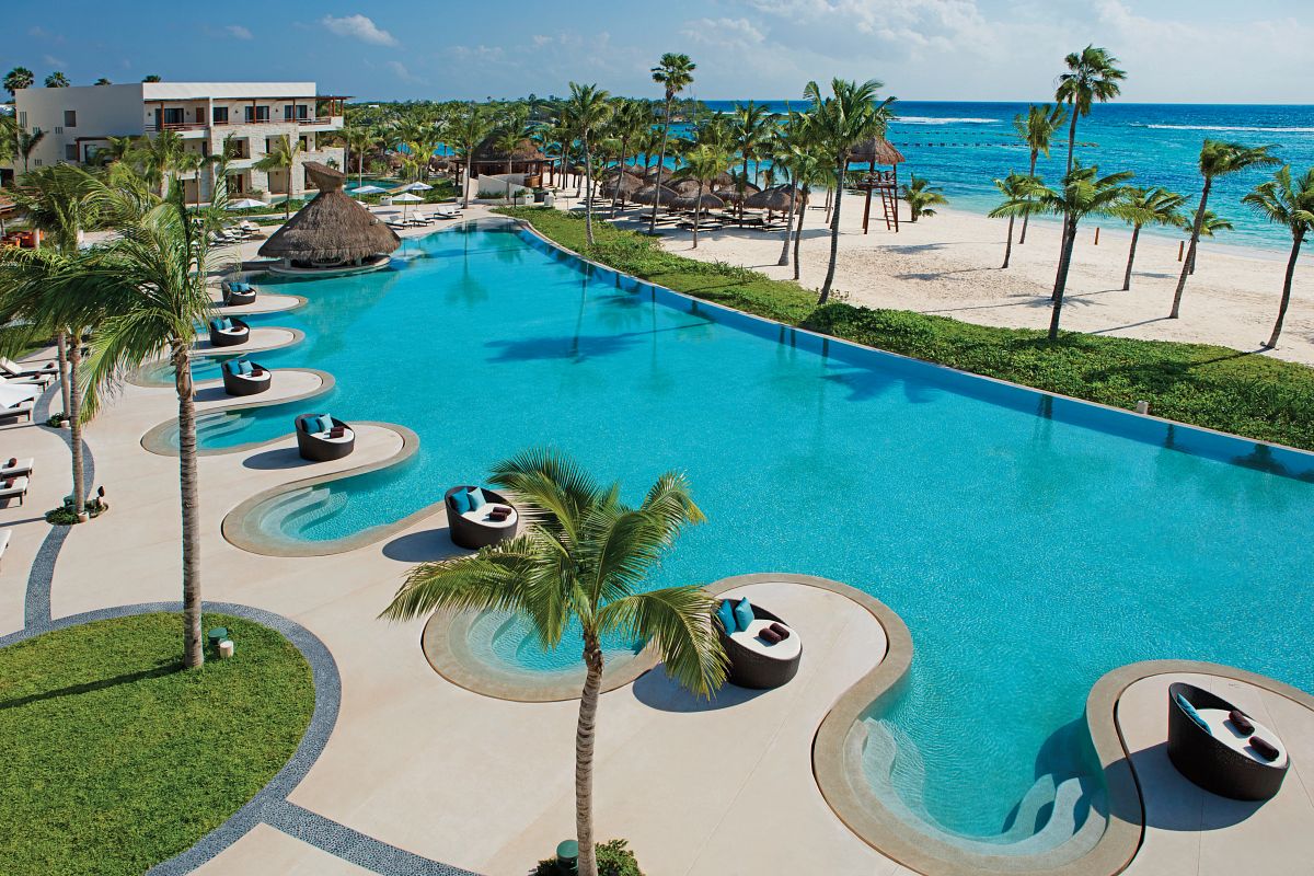 Oceanfront infinity pool at Secrets Akumal Riviera Maya